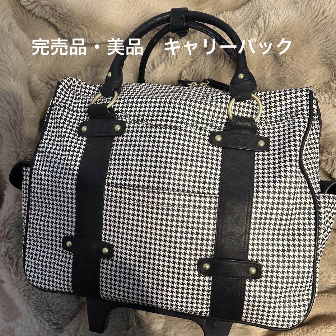 ナタリーヌ・トロワ」代官山クロシェット 息苦しく 千鳥格子