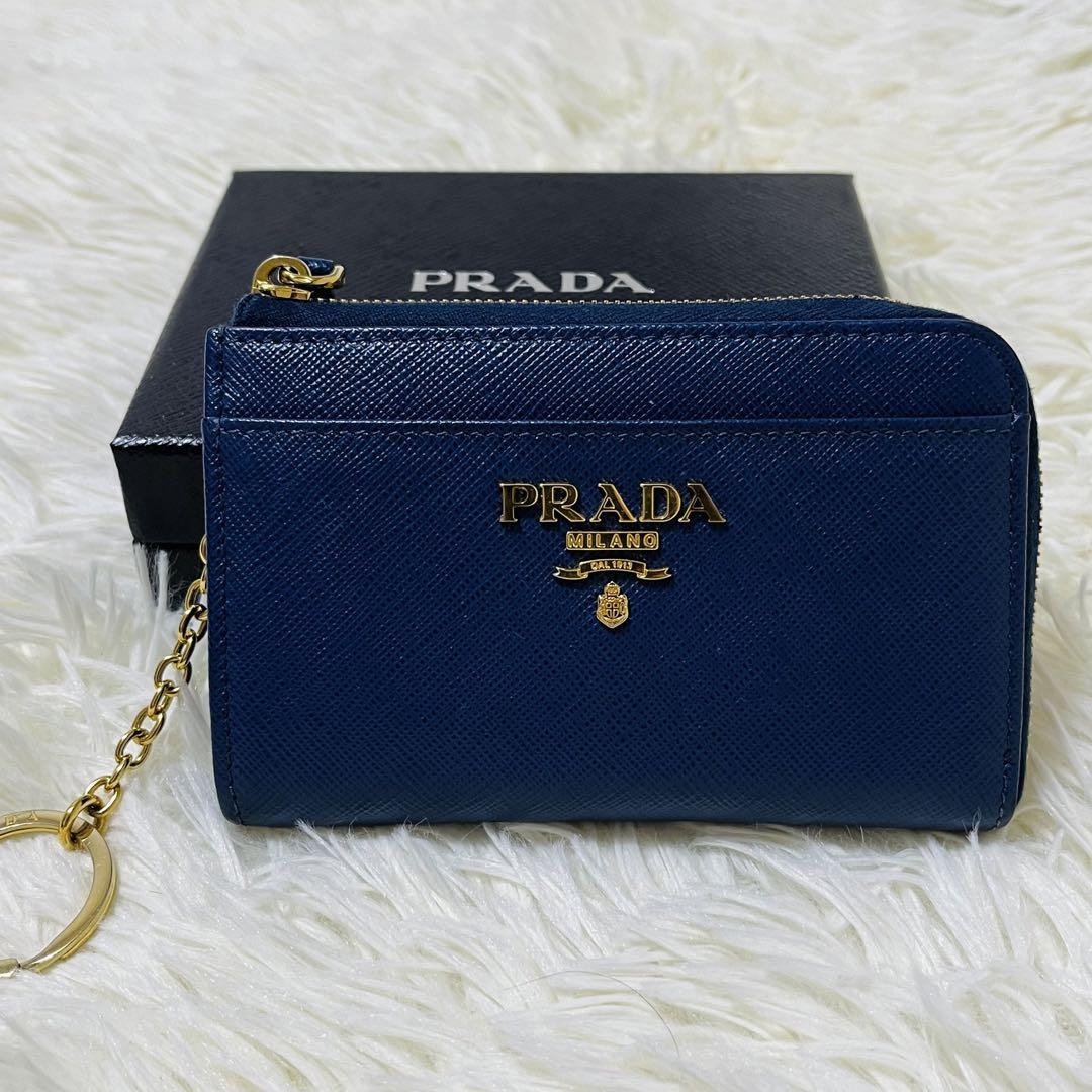 PRADA プラダ キーリング付きL字ファスナーコインケースサフィアーノ ミラノメタルロゴブラック ネイビー ピンクレッド ライトブルー ベージュ  ライトピンク ミントグリーン小銭入れ キーホルダー 定期入れキーチェーン パスケース | kaminorth