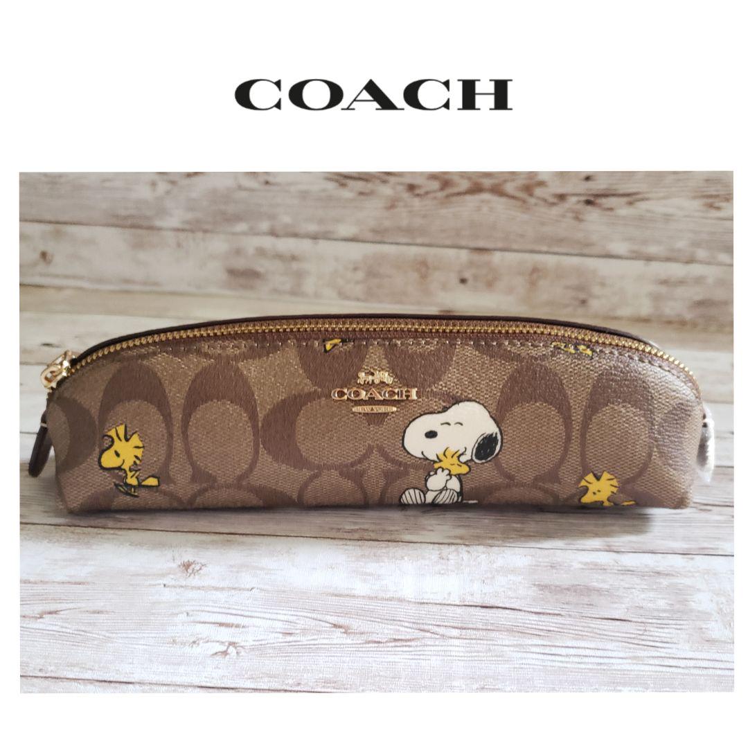 新品【Coach X Peanuts】コーチシグネチャー ほどよく スヌーピー ペンケース